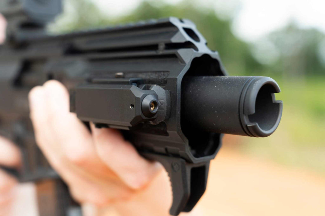 Osprey Global Covert Green rechargeable rifle laser mounted on Picatinny rail with green beam
