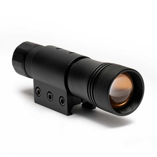Black handheld weapons mountable multicolored tactical flashlight with picatinny mount and textured grip