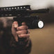 Osprey Battlegrip Blue Laser and Flashlight Combo mounted on rifle with bright LED light.
