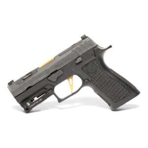 Ultra Thin Red Laser mounted on handgun with low-profile design and ambidextrous controls