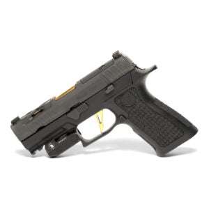 Mini green laser attached to handgun with picatinny rail, compact aluminum alloy matte black design, output power under 5mW.