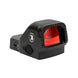 Compact black RMR Multi Reticle Red Dot Sight with rechargeable battery and crashproof hood for pistols and small rifles.
