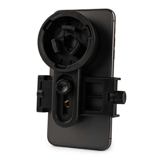 Black camera adapter attached to smartphone for use with spotting scopes, compatible with most smartphones and backed by lifetime warranty