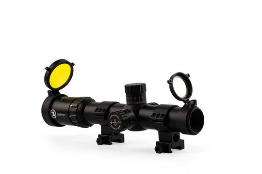 Elite Series 1-10x28 FFP Scope by Osprey with illuminated etched glass reticle, exposed locking turrets, black matte finish, and flip-up lens covers.
